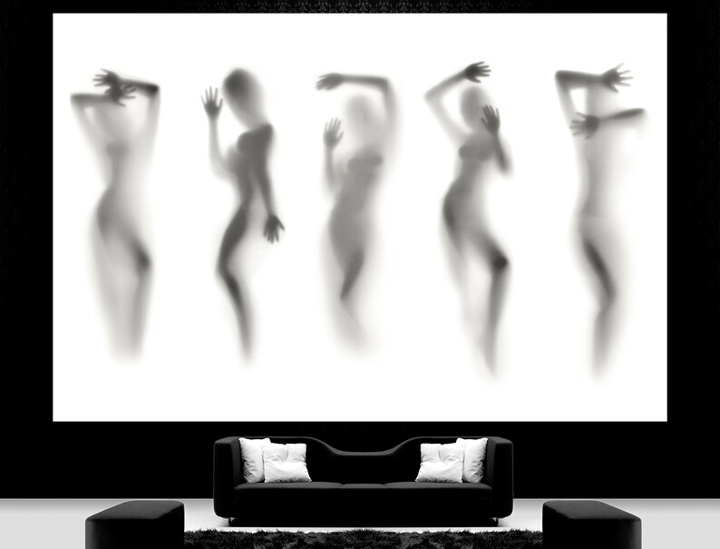May include: Five blurry silhouettes of people in a black and white photograph. The silhouettes are in various poses and are positioned in a row against a white background.