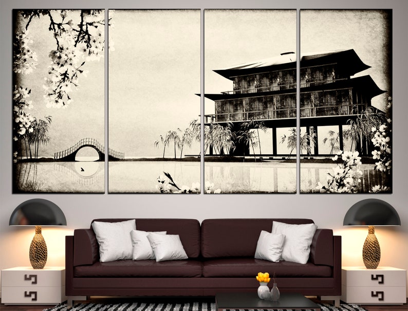 May include: A black and white canvas print of a traditional Japanese house with a bridge and cherry blossoms. The house is on stilts over a body of water. The print is divided into four panels.