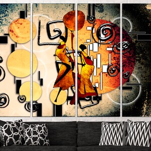 May include: Abstract art print featuring two stylised figures in yellow, orange, and red against a background of black, white, and orange circles and swirls.