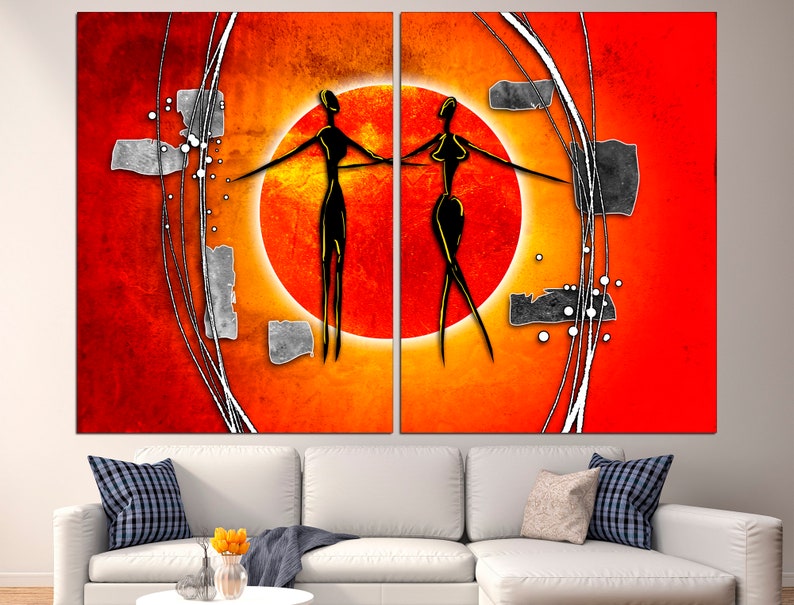 May include: Abstract art print featuring two stylized figures in black against a red and orange background with white lines and circles.