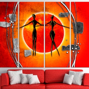 May include: Abstract art print featuring two stylized figures in black against a red and orange background with a large orange circle in the center.