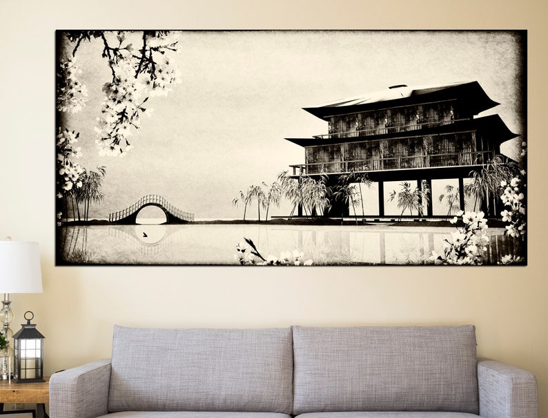 May include: A black and white illustration of a traditional Japanese house with a bridge and cherry blossoms. The house is on stilts over a body of water. The image has a vintage, faded look.