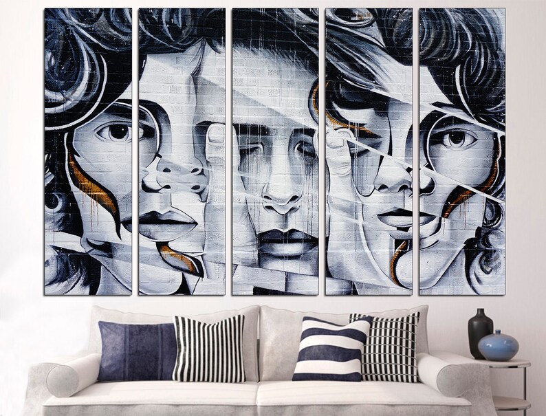 May include: A five-piece abstract art print set featuring a black and white portrait of a person with gold accents. The portrait is split into five sections, each showing a different part of the face.