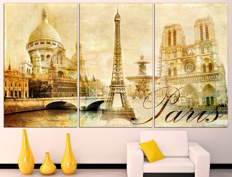 May include: A vintage-style triptych canvas print featuring iconic Parisian landmarks, including the Eiffel Tower, Sacr&eacute;-C&oelig;ur Basilica, and Notre Dame Cathedral. The print has a faded, textured background and the word "Paris" in a stylized font.