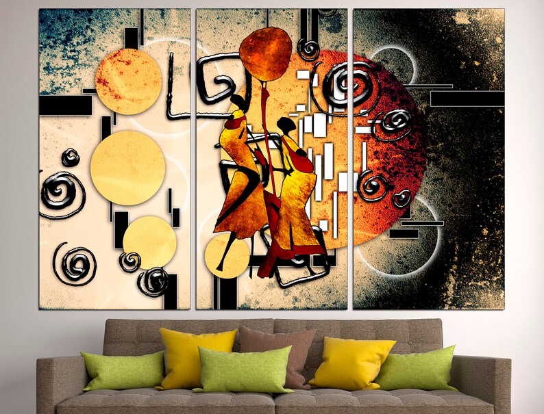 May include: A three-panel abstract art print featuring stylised figures in yellow and orange against a background of black, white and grey geometric shapes and swirls.