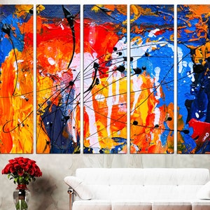 May include: Abstract art painting with a multi-panel design. The painting features bold strokes of blue, red, orange, yellow, and white paint. The painting is a modern and contemporary style.