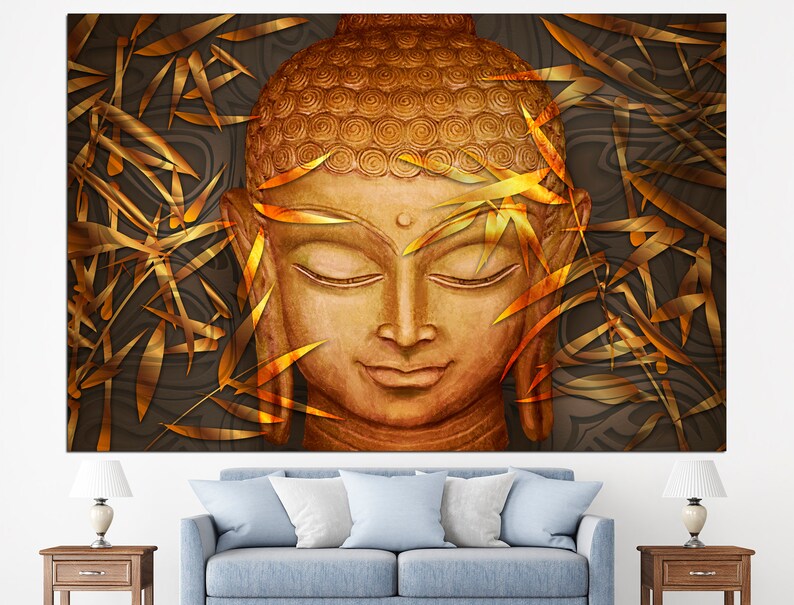 May include: A golden Buddha statue with closed eyes, surrounded by gold leaf bamboo branches against a dark brown background.