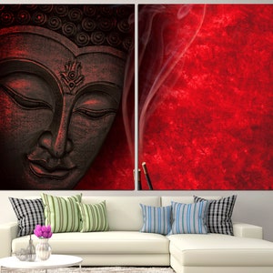 May include: A black and white Buddha statue with a red background and smoke rising from incense sticks.