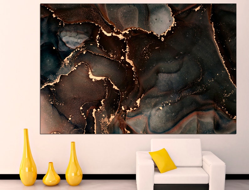 May include: Abstract art print with swirling black, brown, and gold colors. The print features a marbled effect with gold accents.