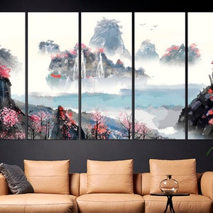 May include: A multi-panel canvas print depicting a watercolor painting of a misty mountain landscape with waterfalls and pink blossoms. The painting is in shades of blue, gray, and pink.