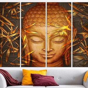 May include: A multi-panel canvas print featuring a golden Buddha head with closed eyes, surrounded by stylized golden bamboo leaves on a dark brown background.