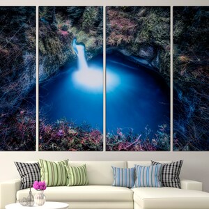 May include: A four-panel canvas print of a waterfall cascading into a deep blue pool surrounded by lush green foliage.
