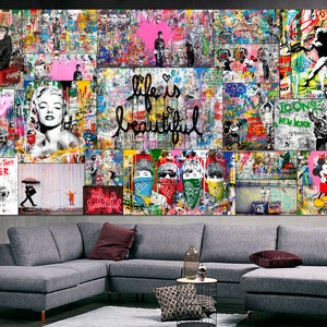 May include: A large, colorful collage of graffiti art with a variety of images, including Mickey Mouse, a woman with a heart, and the words "Life is beautiful". The collage is displayed on a wall above a gray sectional sofa.