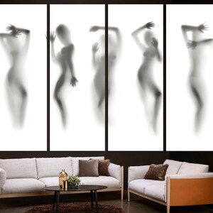 May include: A set of five black and white abstract art prints featuring silhouettes of people in various poses. The prints are framed and displayed on a white wall.