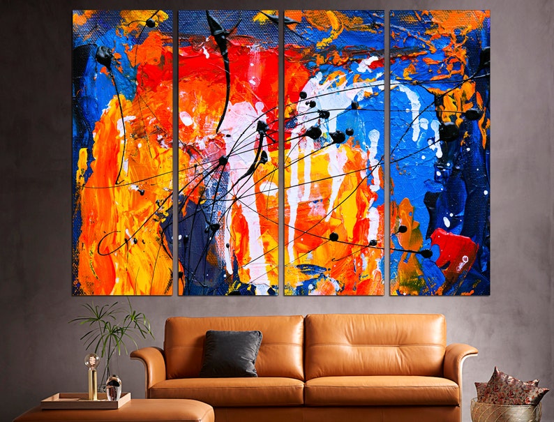 May include: Abstract art painting with a multi-panel design. The painting features bold strokes of blue, orange, yellow, and white paint. The painting is a modern and contemporary style.