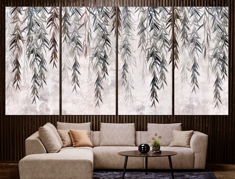 May include: A modern living room with a sectional sofa and a coffee table. The wall behind the sofa features a large-scale print of a watercolour painting of willow branches hanging down.