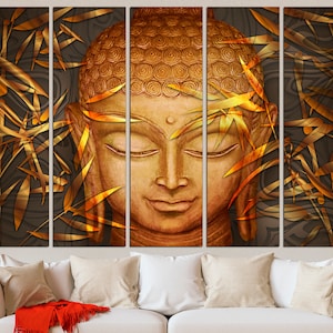 May include: A multi-panel canvas print featuring a golden Buddha face surrounded by stylized gold bamboo leaves on a dark brown background.