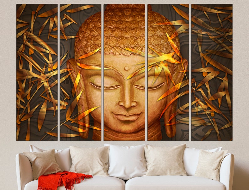 May include: A multi-panel canvas print featuring a golden Buddha face surrounded by stylized gold bamboo leaves on a dark brown background.