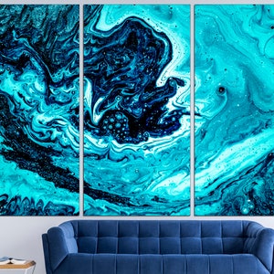 May include: Abstract art print featuring a swirling blue and black pattern. The print is divided into three panels, creating a dynamic and modern look.