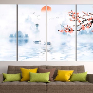 May include: A four-panel canvas print depicting a serene landscape with mountains, a lake, and a blooming cherry blossom tree. The sky is a soft blue with a hint of orange, suggesting a sunrise or sunset. The water is calm and reflective, with a few boats floating on its surface. The mountains are misty and ethereal, creating a sense of peace and tranquility.