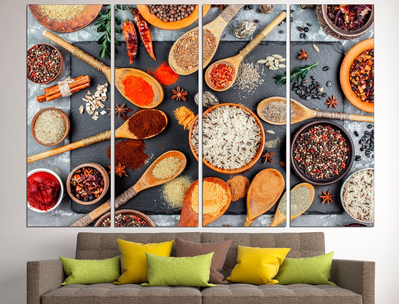 May include: A close-up of a variety of spices and grains arranged on a black slate surface. The spices include red pepper flakes, cumin, coriander, and black peppercorns. The grains include rice, quinoa, and couscous. The image is a still life of various spices and grains.