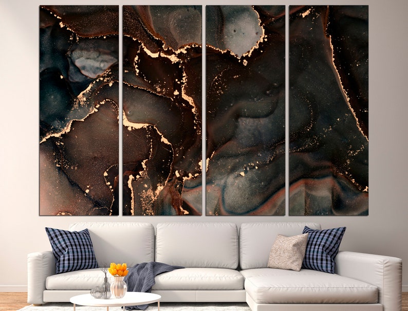 May include: Abstract art print with a dark background and gold accents. The print is divided into four panels, each with a unique swirling pattern. The gold accents are reminiscent of marble.