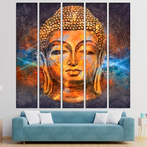 May include: A five-panel canvas art piece featuring a detailed, golden-hued Buddha head. The artwork has a textured appearance with orange, blue, and brown tones, set against a dark background with geometric patterns. The Buddha's face is serene.