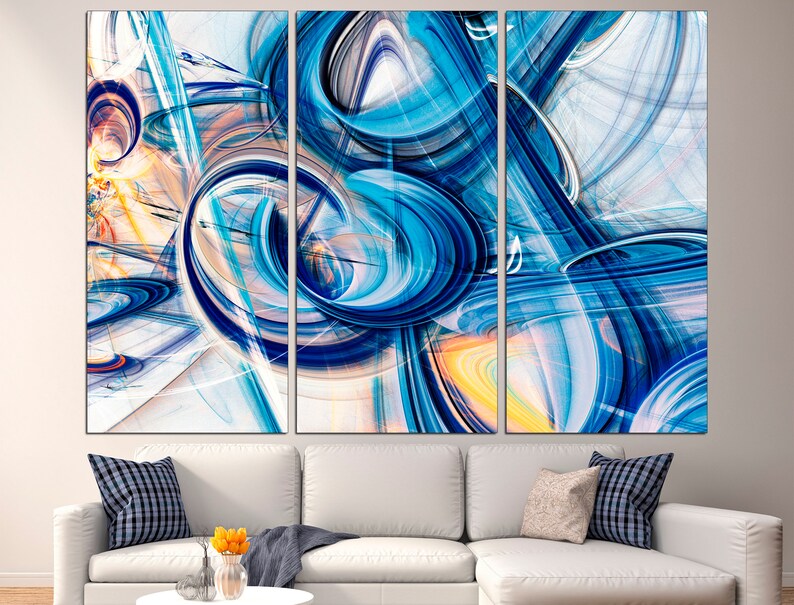 May include: Abstract art print with a blue, white, and yellow color scheme. The print features swirling lines and circles, creating a dynamic and energetic composition.