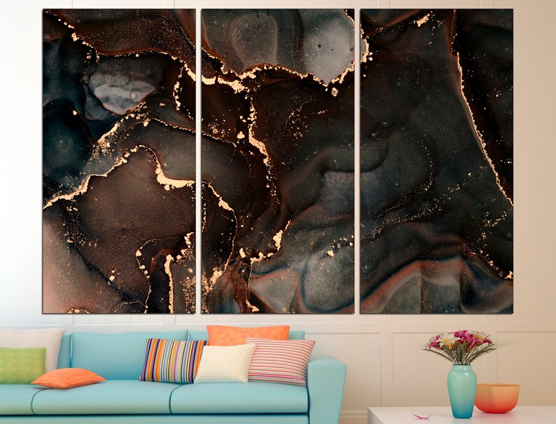 May include: Abstract art print with a black, brown, and gold color scheme. The print features a swirling, marbled pattern with gold accents.