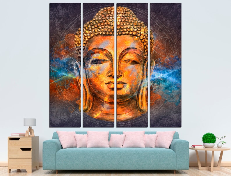 May include: A four-panel wall art set featuring a detailed, colorful depiction of a Buddha head. The artwork uses orange, gold, and blue hues, with a textured, abstract background. The Buddha's face is serene, with closed eyes.