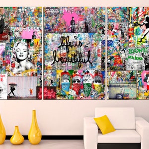 May include: A colorful triptych canvas print with a collage of images, including a woman with a pink heart, a group of people with bandanas, and Mickey Mouse and Minnie Mouse. The text "Life is beautiful" is written in large, bold letters.
