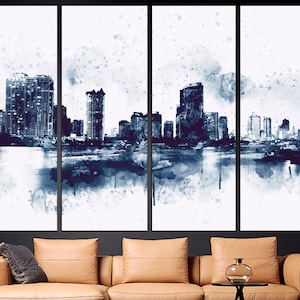 May include: A watercolor painting of a city skyline in shades of blue and white. The painting is divided into three panels, each depicting a different section of the city. The buildings are tall and slender, and the water in the foreground is calm and reflective.