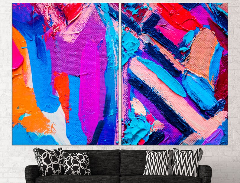 K&ouml;nnte beinhalten: Abstrakter Kunstdruck mit kr&auml;ftigen Strichen in Blau, Rosa, Orange und Lila. Der Druck ist in zwei Paneele unterteilt.