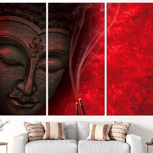 May include: A tri-panel canvas print featuring a black and red image of a Buddha statue with incense smoke rising from the bottom of the image.