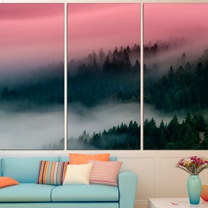 May include: A tri-panel canvas print featuring a misty forest scene with a pink and purple gradient sky. The forest is layered with dark green trees and white fog.