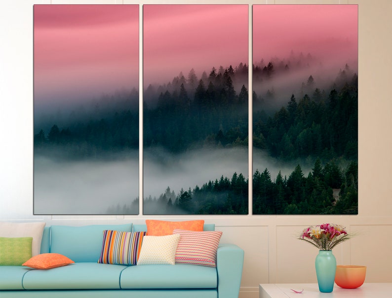 May include: A tri-panel canvas print featuring a misty forest scene with a pink and purple gradient sky. The forest is layered with dark green trees and white fog.