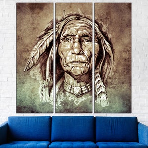 May include: A triptych canvas print featuring a sepia-toned portrait of a Native American chief. The artwork showcases detailed facial features, a feathered headdress, and a beaded necklace. The background has a textured, aged appearance, with a blue sofa in the foreground.