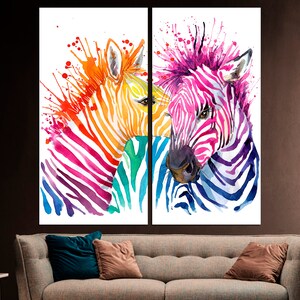 May include: Two colorful zebra heads painted in a watercolor style with splashes of color. The zebra on the left is painted in shades of orange, yellow, pink, and purple. The zebra on the right is painted in shades of blue, purple, and pink.