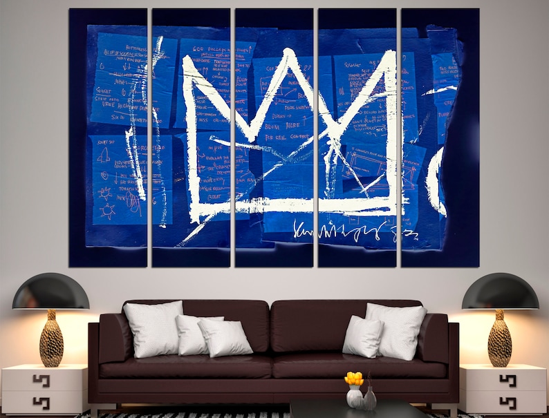 May include: A five-panel canvas print of a white crown painted on a blue background with scribbled notes in pink and white. The crown is a simple design with a pointed top and a rounded base. The background is a deep blue with a textured look. The notes are in a variety of styles and sizes, and some are partially obscured by the crown.