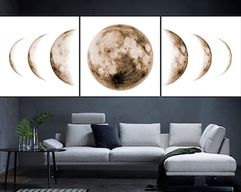 May include: A three-piece canvas wall art set featuring a brown moon in different phases. The moon is depicted in a realistic style with a textured surface.