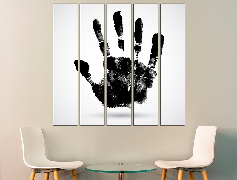 May include: A black and white abstract art print of a handprint on a white background. The print is divided into five sections.