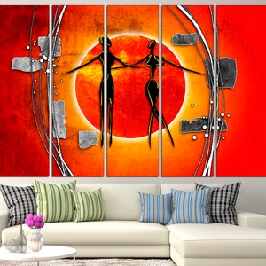 May include: Abstract art print with two figures in black silhouette dancing against a large orange sun with a red background. The print is divided into five panels.