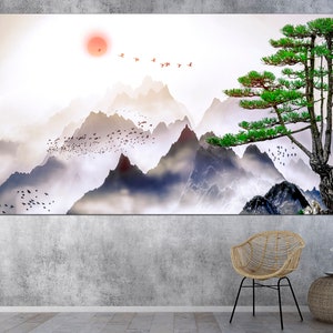 May include: A watercolor painting of a mountain landscape with a single pine tree on a rocky cliff. The mountains are covered in fog and the sky is a soft white with a red sun.
