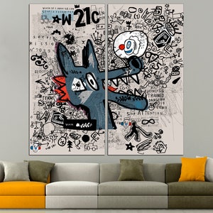 May include: A split canvas print with a cartoon wolf in the center. The wolf is blue and gray with red accents. The background is a white and gray collage of text and drawings. The text includes words like "W21C", "TEAM", "DANGER", and "ATTENTION".