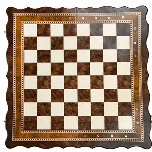 Anthony Elanga's potential move to Newcastle illustrated with a strategic chess set