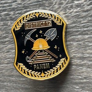 District 12 Dystopian Enamel Pin