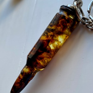 Natural Baltic Amber Souvenir Bullet On The Key 11g. Bead Keychain
