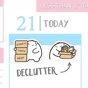 Peut inclure: Adorables autocollants pour planificateur sur le thème du désencombrement. Un autocollant montre un personnage tenant des boîtes avec les mots "Donner", "Jeter" et "Garder". L'autre montre un personnage avec une boîte d'objets.