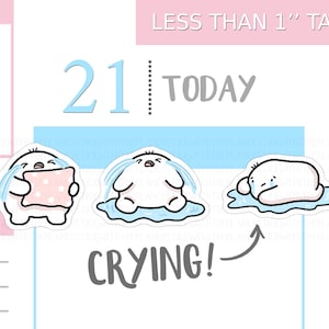 May include: Three white cartoon stickers with crying faces. One holds a pink pillow with white polka dots, another sits in a puddle, and the last lies in a puddle. Text includes "LESS THAN 1" TALL", "21", "TODAY", and "CRYING!"
