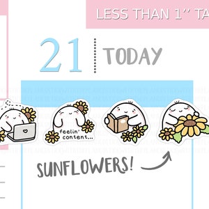 May include: A sheet of stickers featuring cartoon characters with sunflowers. One sticker shows a character with a laptop, another with the text "feelin' content...", one reading a book, and one with a large sunflower. The text "SUNFLOWERS!" is also present.
